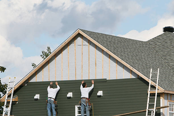 Professional Siding Replacement technician working in Huntingtown, MD